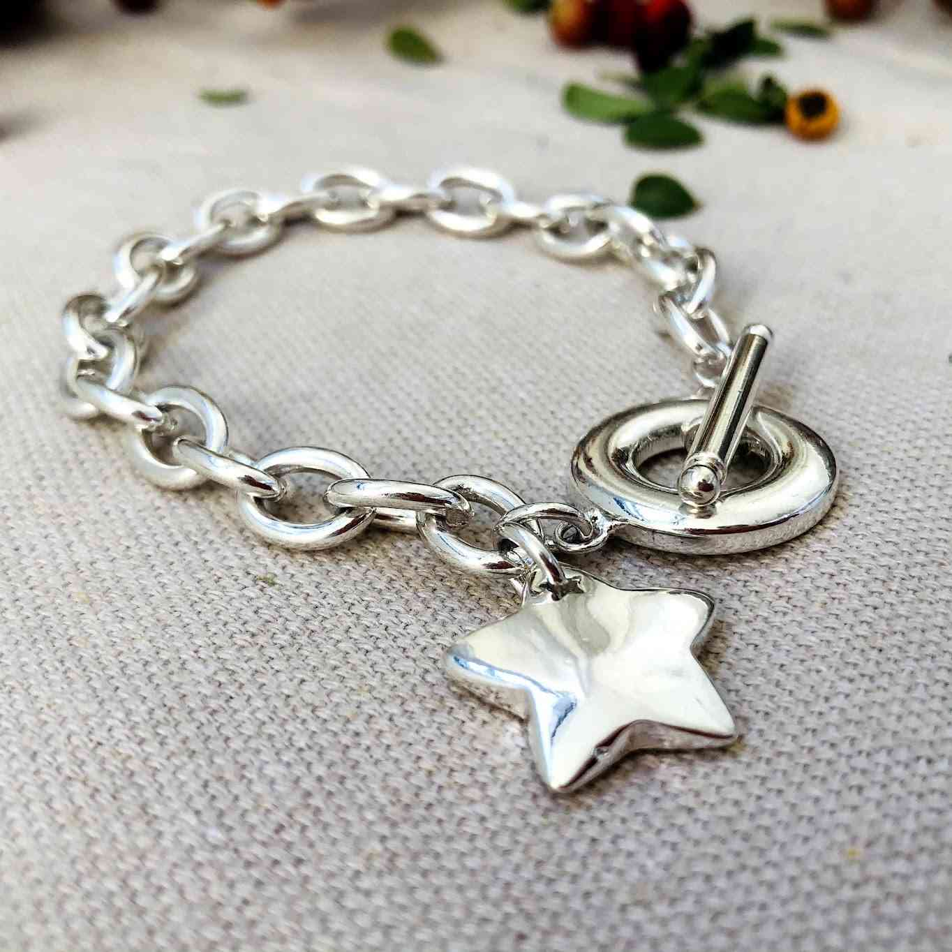 Pulsera de cadena con estrella y cierre ancla plateado de acero quirúrgico