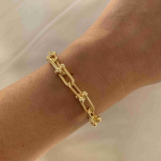 Pulsera con eslabones cortos dorado de acero quirúrgico