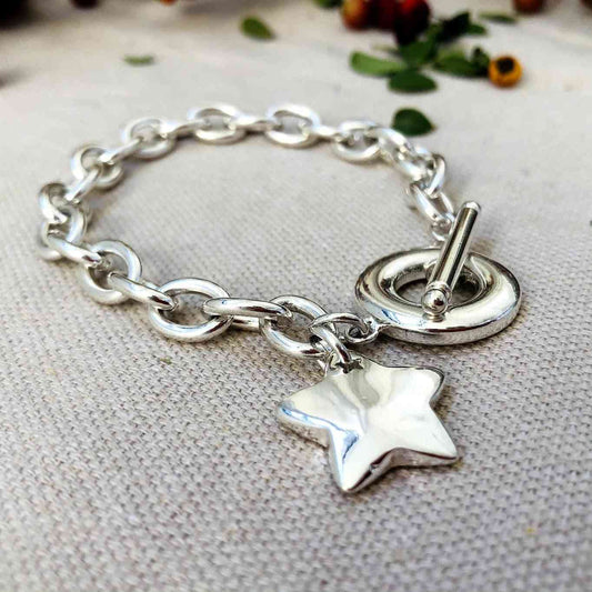 Pulsera de cadena con estrella y cierre ancla plateado de acero quirúrgico